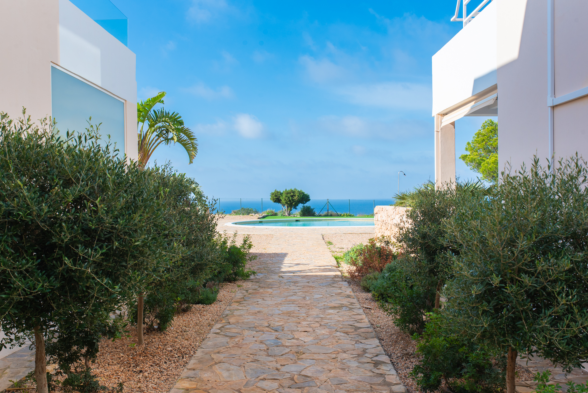 Resa estates Ibiza playa Cala Tarida for sale te koop community .jpg